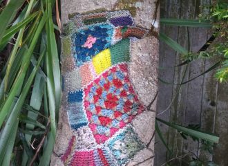 Yarn bombing on a tree at Wellington High School